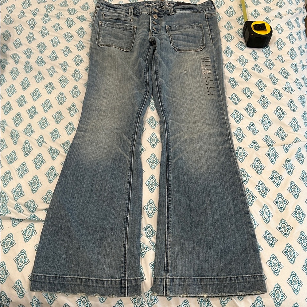 American Eagle Outfitters Vintage Flare distressed exposed button fly  jeans NWT